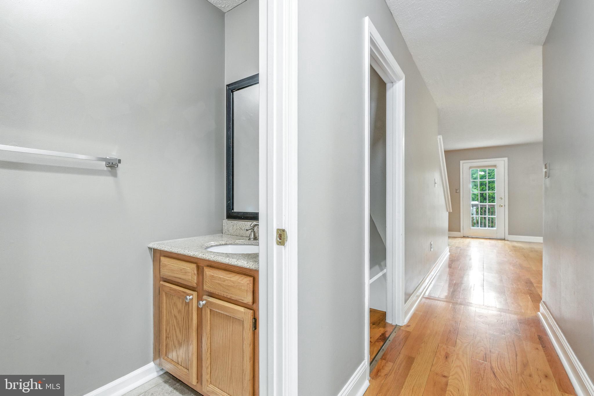 111 Gateway Drive Newark, DE 19711 - Photo 9 of 20 a view of a kitchen from a hallway