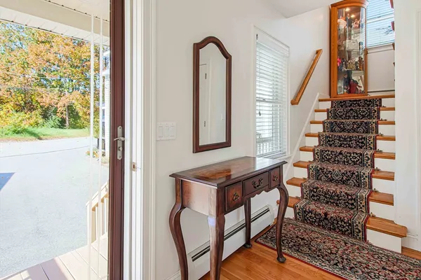 a view of entryway with a front door