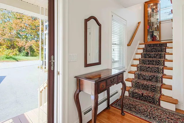 a view of entryway with a front door