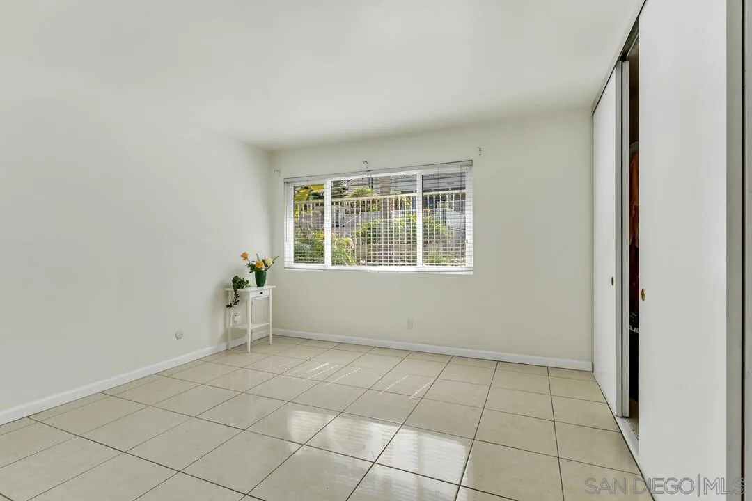 8536 Via Mallorca, Unit B La Jolla, CA 92037 - Photo 13 of 34 an empty room with windows