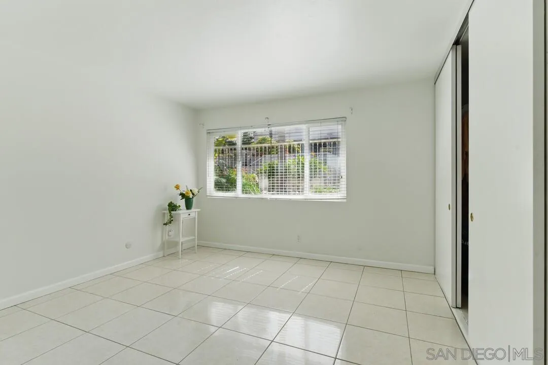 8536 Via Mallorca, Unit B La Jolla, CA 92037 - Photo 15 of 34 an empty room with windows