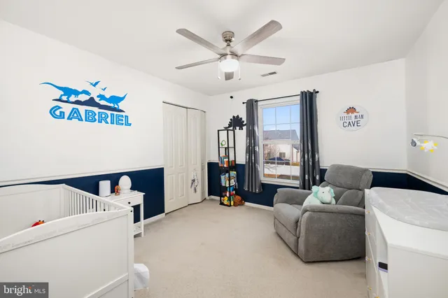 a bed room with a bed and a couch