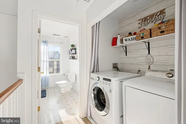a utility room with dryer and washer