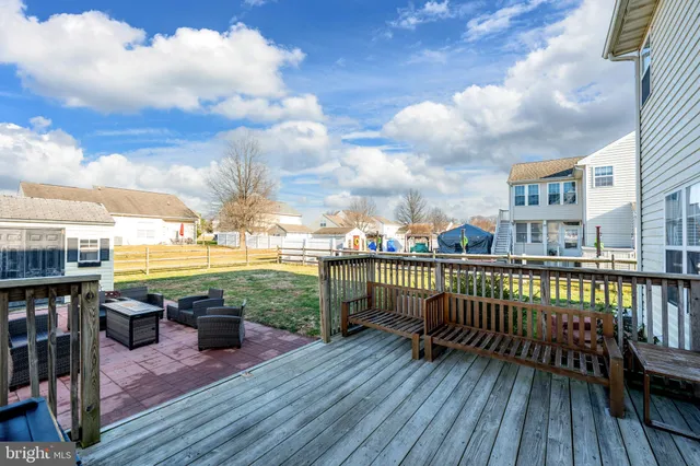 a view of roof deck with patio