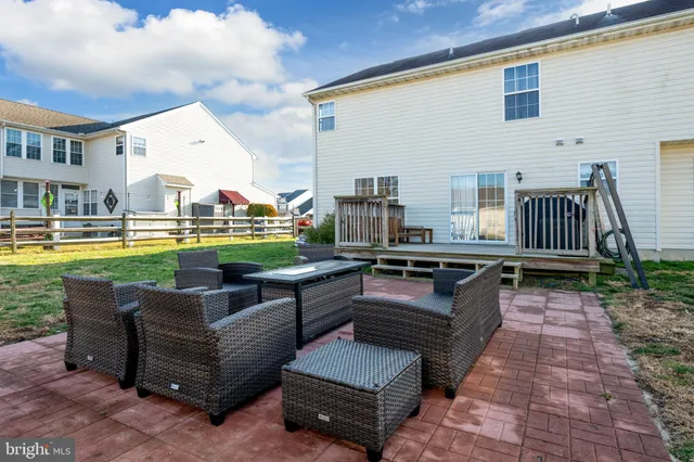 a view of yard with swimming pool and green space