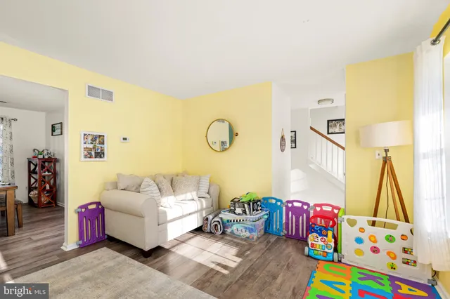 a living room with furniture and a couch