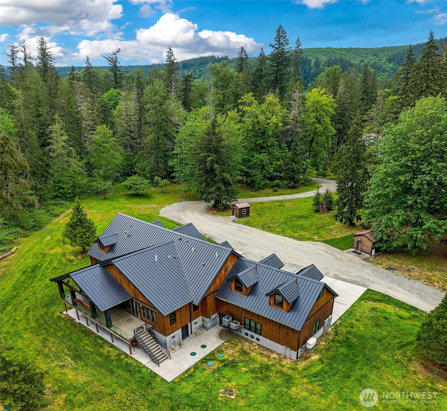 7538 Moon Valley Road Southeast North Bend, WA 98045 - Photo 36 of 40 an aerial view of a house with a yard