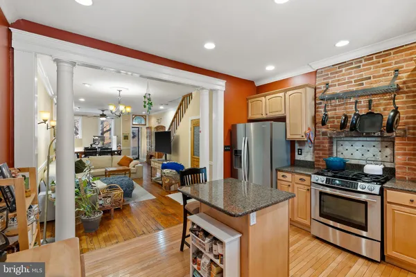 a very nice looking room with a dining table and chairs