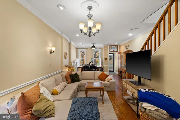 a kitchen with stainless steel appliances granite countertop a stove and a refrigerator