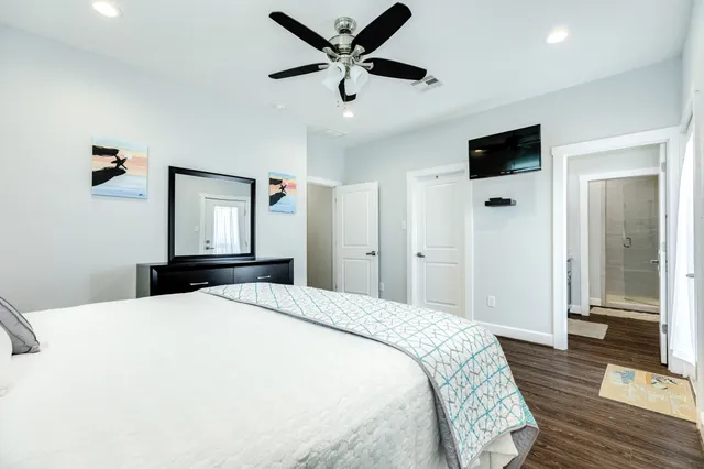 a bathroom with double vanity sinks and a mirror