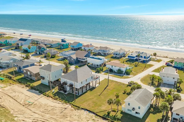 an aerial view of beach and ocean