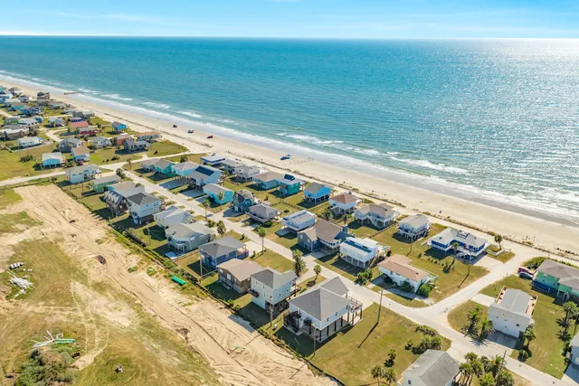 a yard with an ocean view