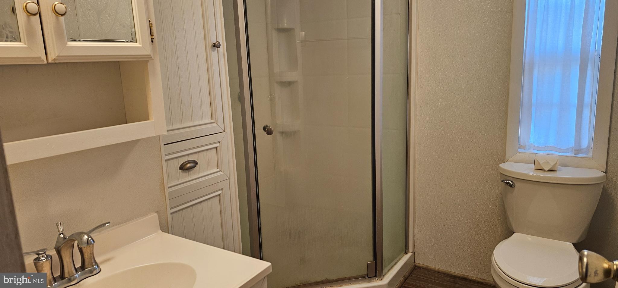 33506 Buttercup Street Lewes, DE 19958 - Photo 6 of 14 Modern bathroom with sleek fixtures.