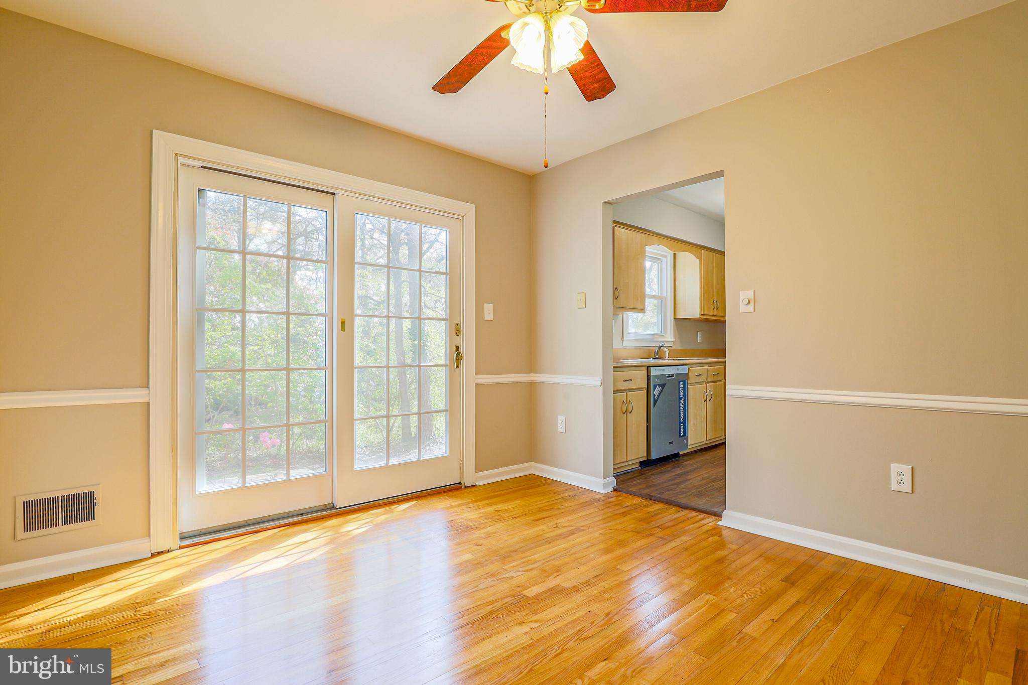 319 Summit Hall Road Gaithersburg, MD 20877 - Photo 12 of 58 Eating area with newer slider and lots of light!
