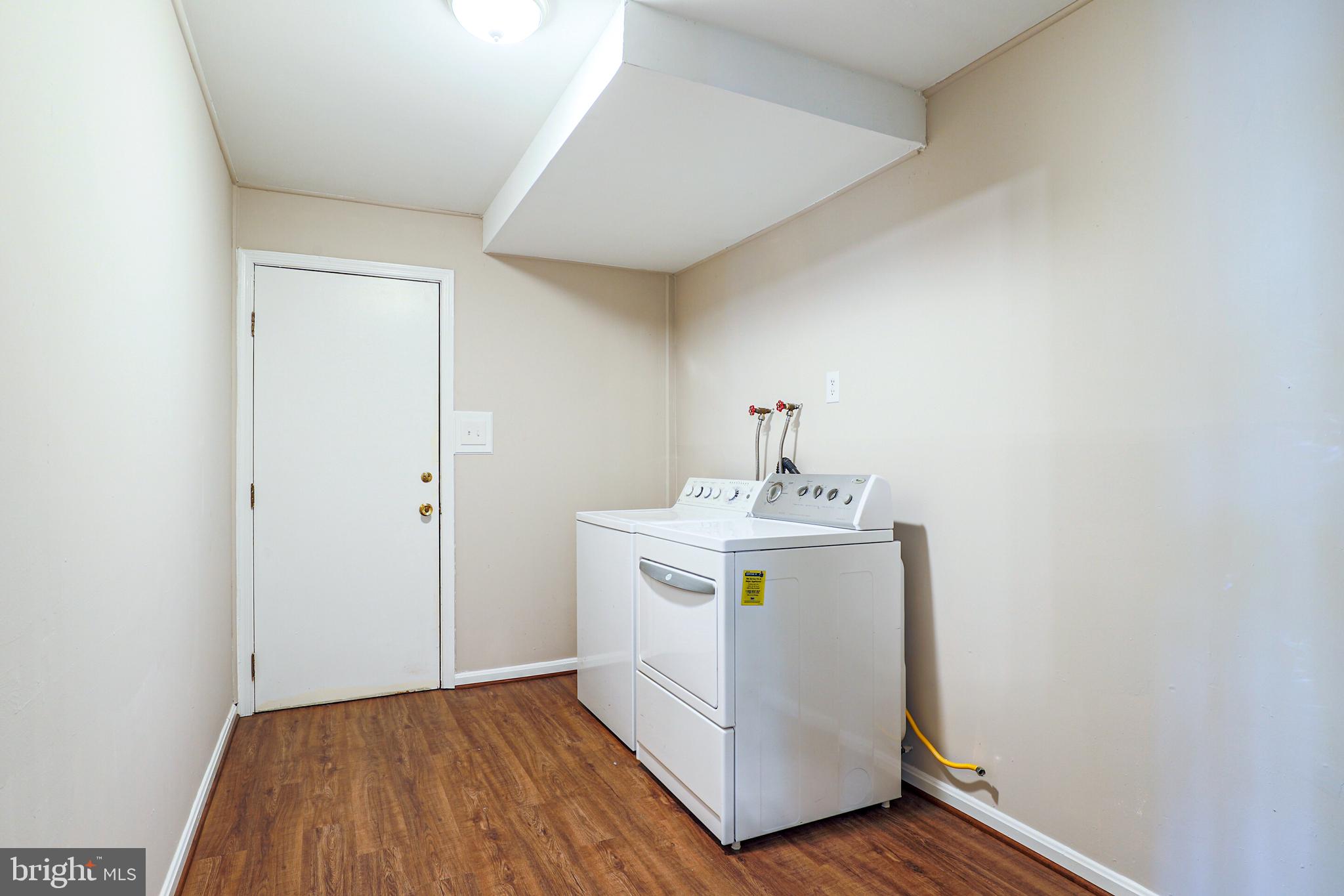 319 Summit Hall Road Gaithersburg, MD 20877 - Photo 28 of 58 Large main level laundry leads to 1 car garage!
