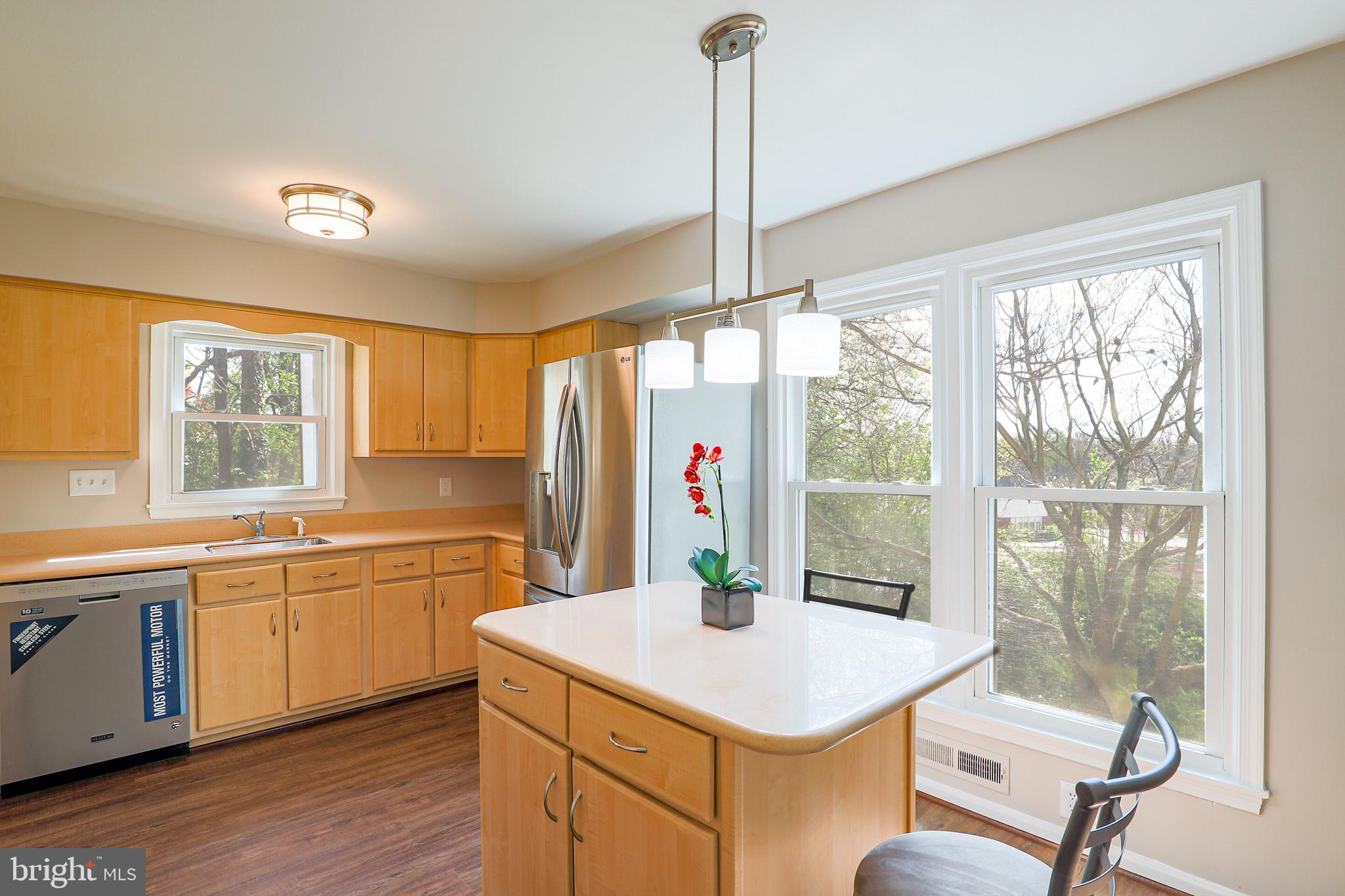 319 Summit Hall Road Gaithersburg, MD 20877 - Photo 4 of 58 Sun soaked kitchen has upgraded cabinets!