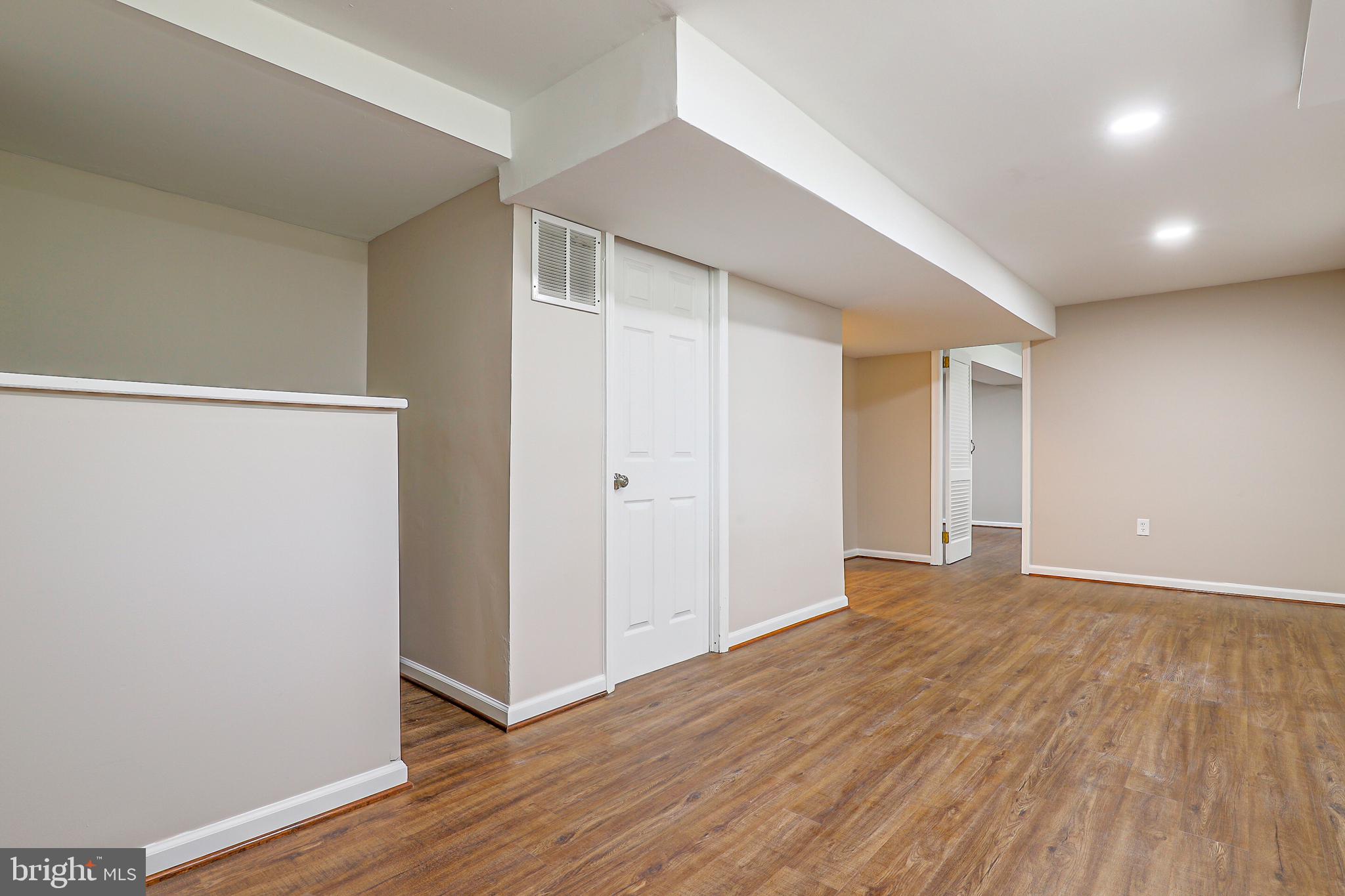 319 Summit Hall Road Gaithersburg, MD 20877 - Photo 55 of 58 Mini bar looking at utility room and 6th BR in LL!