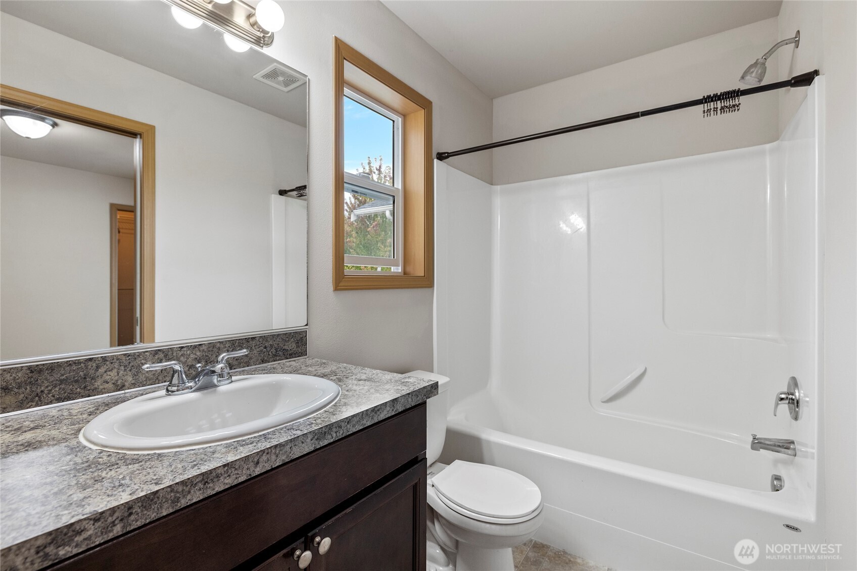 1537 East Gateway Heights Loop Sedro-Woolley, WA 98284 - Photo 13 of 23 a bathroom with a granite countertop sink toilet and shower