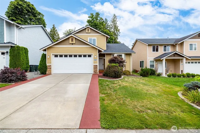 a view of outdoor space yard and front view of a house