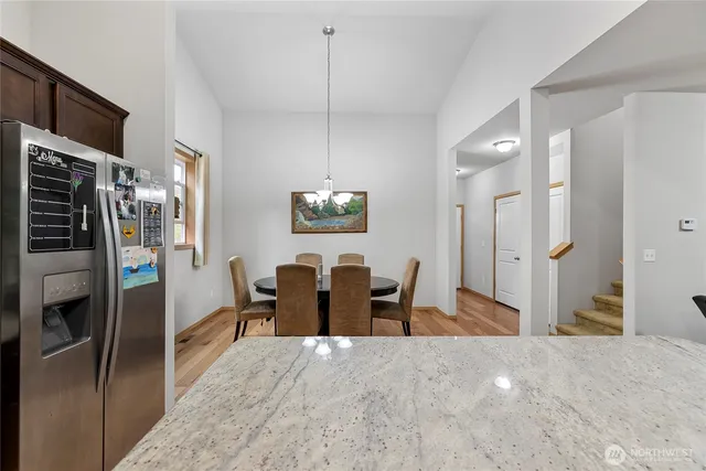 a view of a dining room with furniture