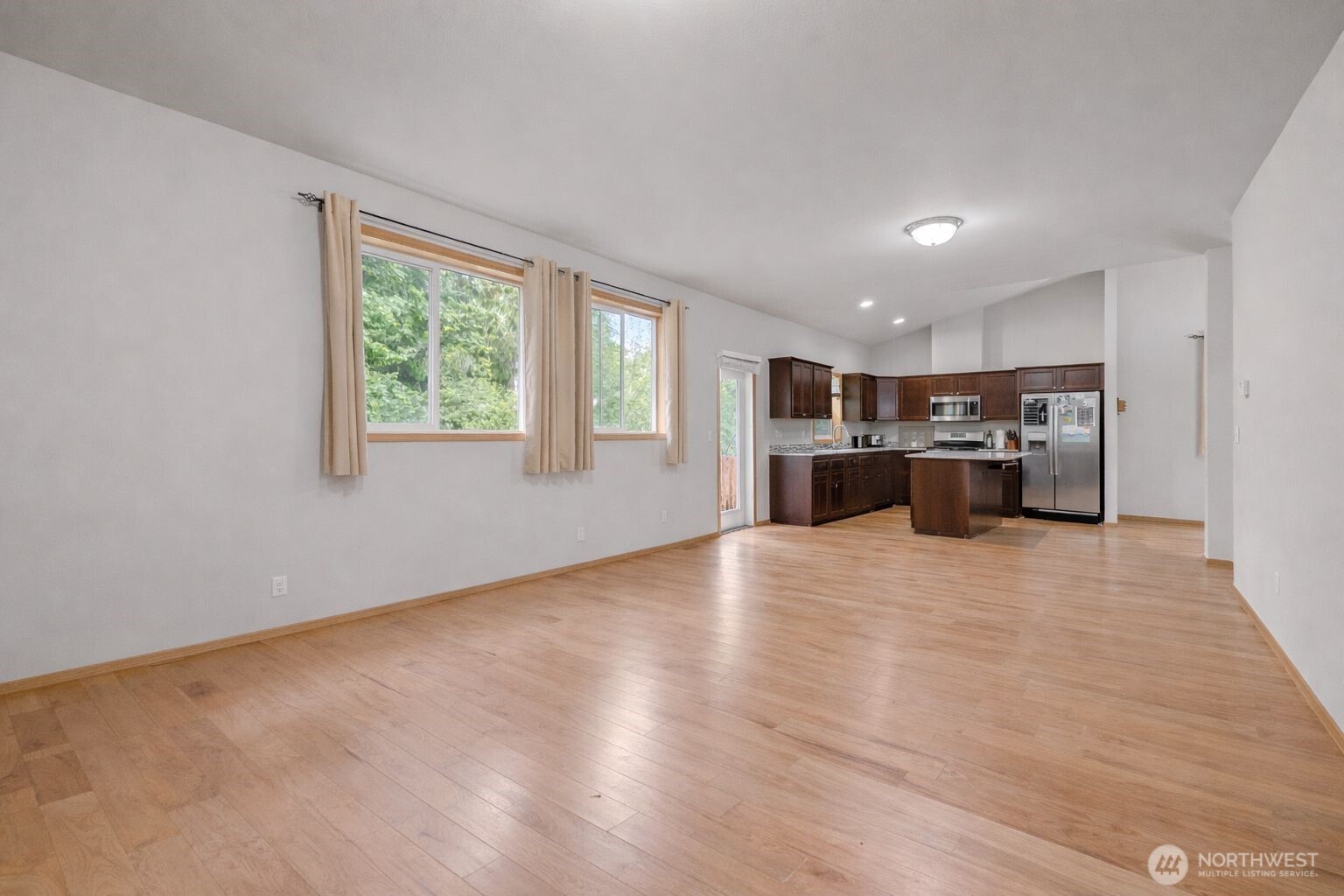 1537 East Gateway Heights Loop Sedro-Woolley, WA 98284 - Photo 8 of 23 a view of empty room with kitchen and window