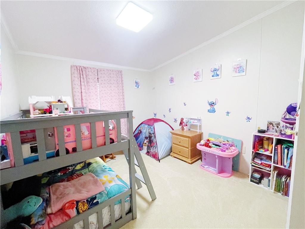 121 Mountain View Drive Berlin, PA 15530 - Photo 22 of 36 a bedroom with furniture and a baby crib