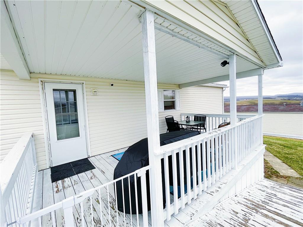 121 Mountain View Drive Berlin, PA 15530 - Photo 33 of 36 a view of a porch with wooden floor