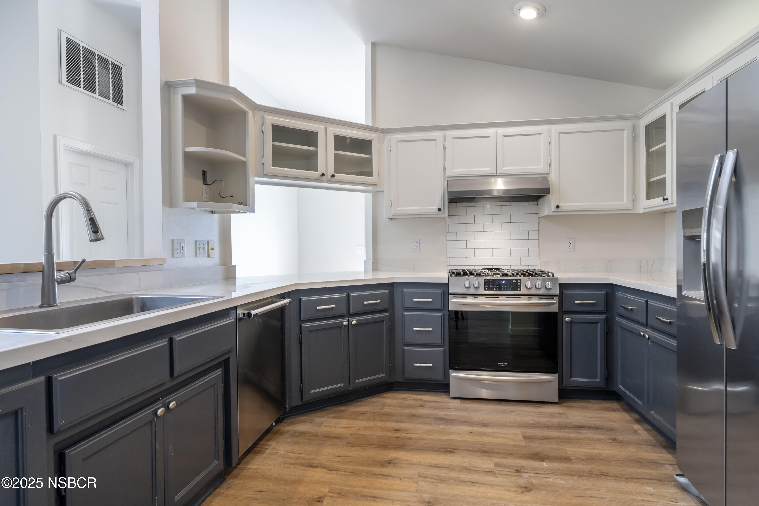 576 Pine Street, Unit A Solvang, CA 93463 - Photo 2 of 19 a kitchen with stainless steel appliances granite countertop a sink stove and refrigerator