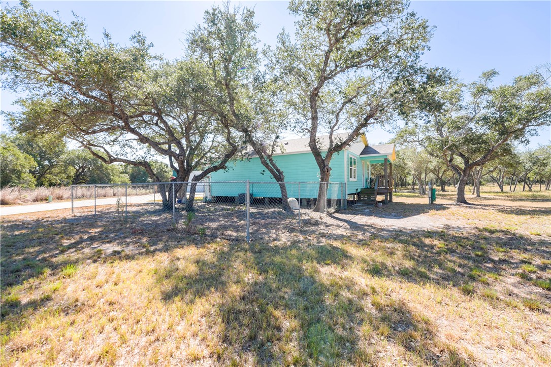 2102 Prairie Road Rockport, TX 78382 - Photo 19 of 26 a view of house with trees in the background