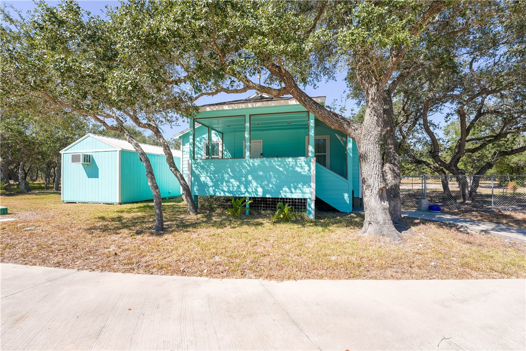 2102 Prairie Road Rockport, TX 78382 - Photo 20 of 26 a front view of a house with a yard