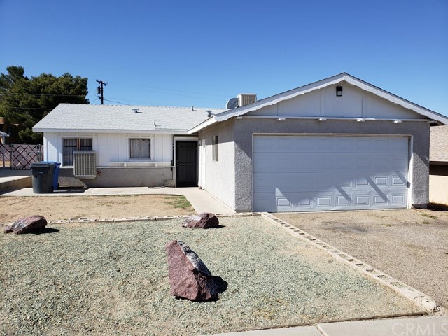 1929 Armory Road Barstow, CA 92311 - Photo 1 of 1 a view of a house with a yard