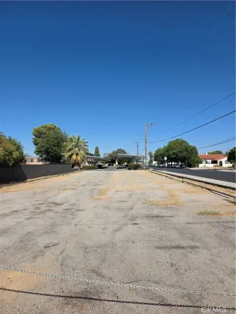 a view of street and car parked
