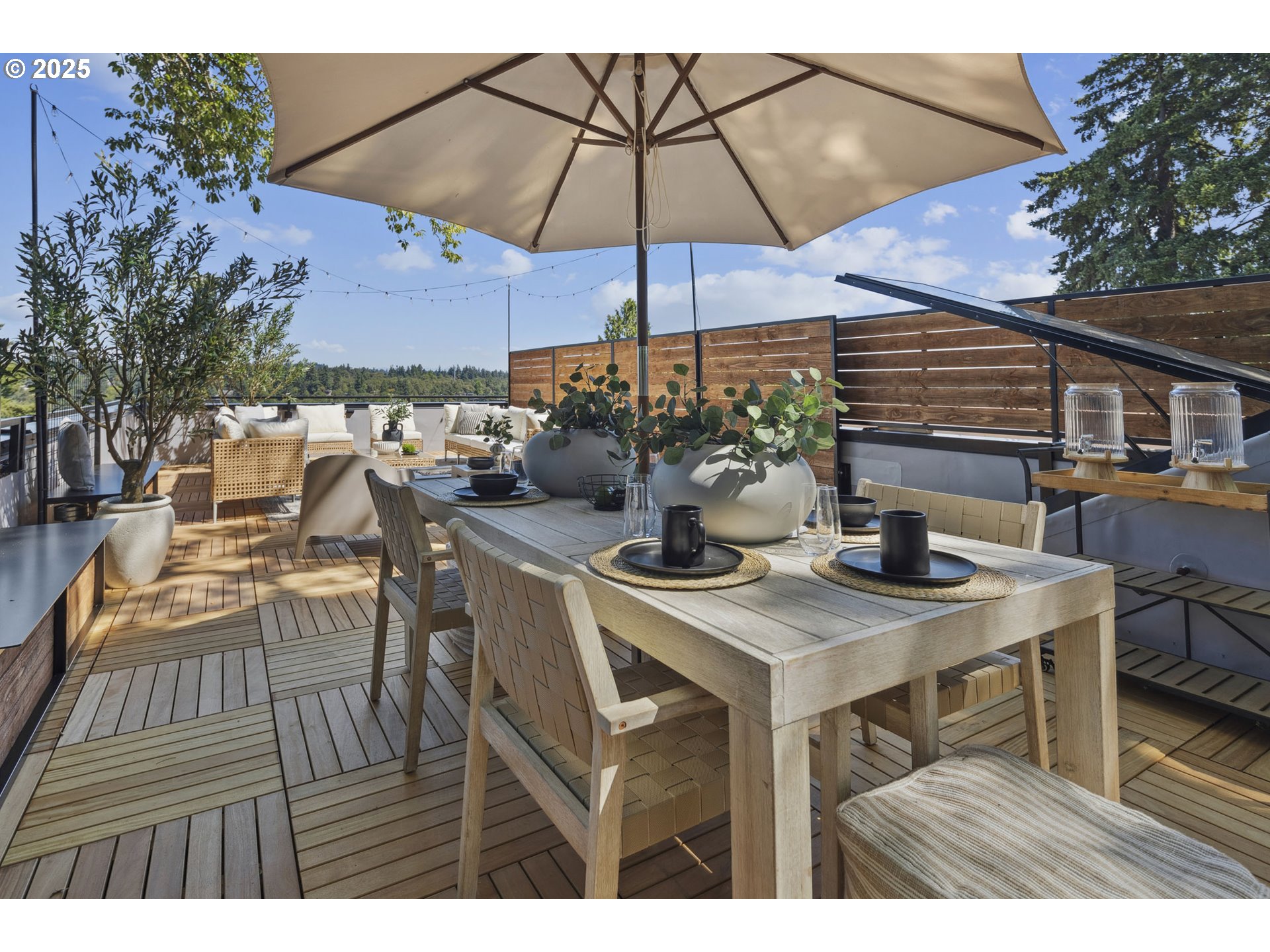 701 1st Street Lake Oswego, OR 97034 - Photo 35 of 42 a view of a patio with furniture and a umbrella