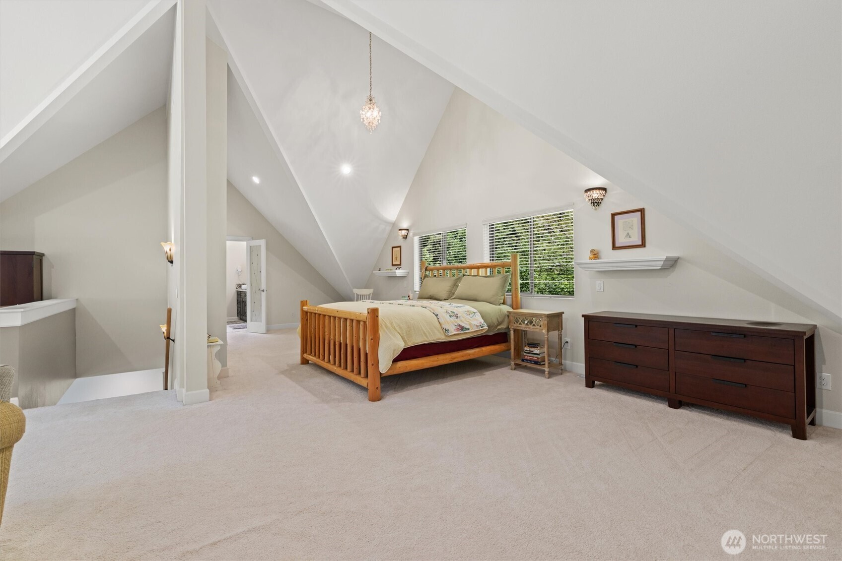 15305 Index-Galena Road Index, WA 98256 - Photo 12 of 38 a spacious bedroom with a bed and a dresser