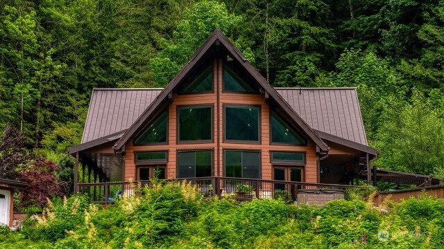 15305 Index-Galena Road Index, WA 98256 - Photo 2 of 38 a front view of a house with garden