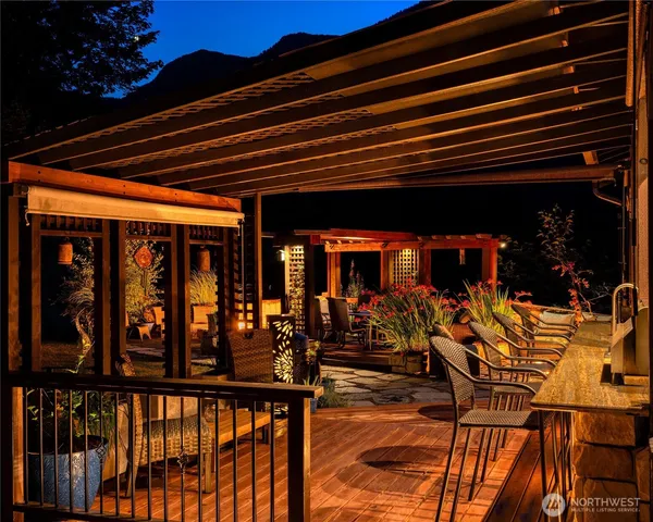 a wooden bench sitting in front of a building