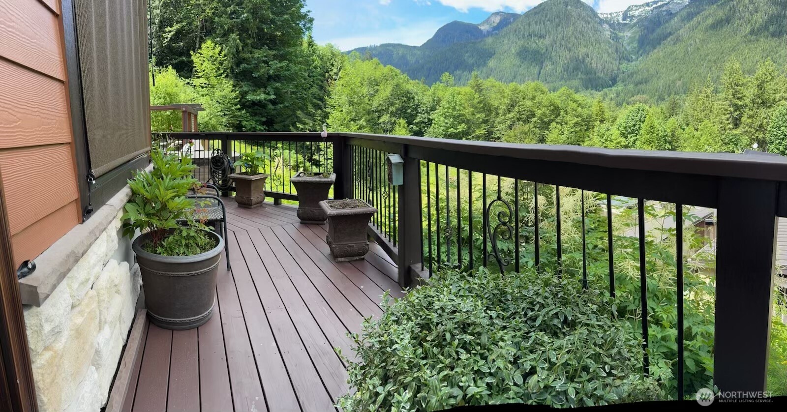 15305 Index-Galena Road Index, WA 98256 - Photo 35 of 38 a view of a balcony with chair and wooden floor