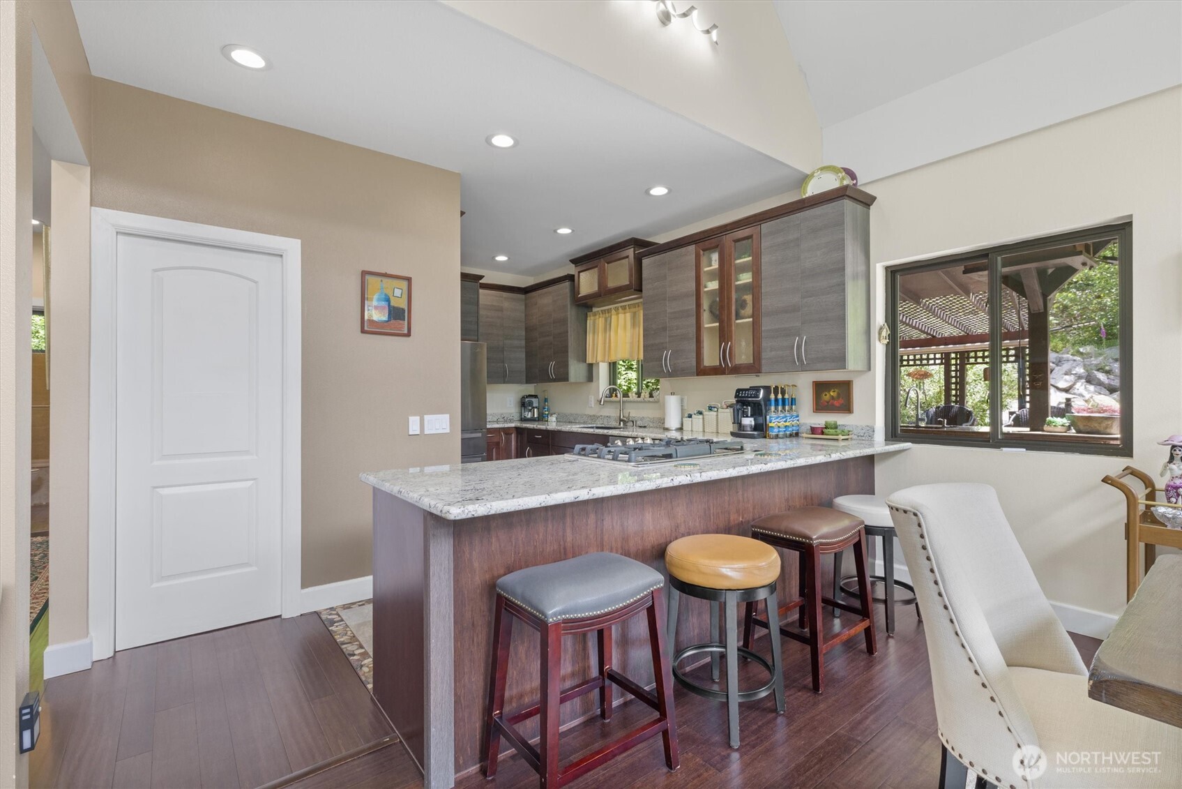15305 Index-Galena Road Index, WA 98256 - Photo 8 of 38 a kitchen with a table and chairs in it