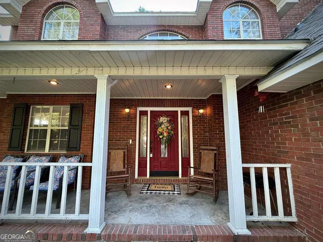 a living room with furniture and a couch