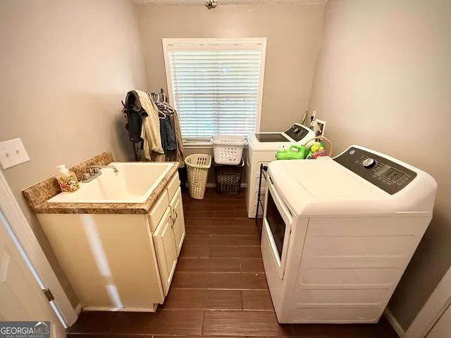 a white bath tub sitting in a bathroom