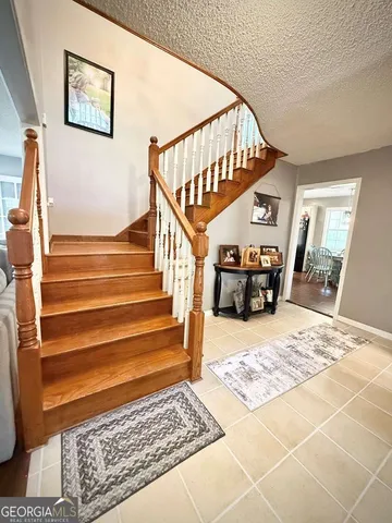 a bathroom with a shower curtain