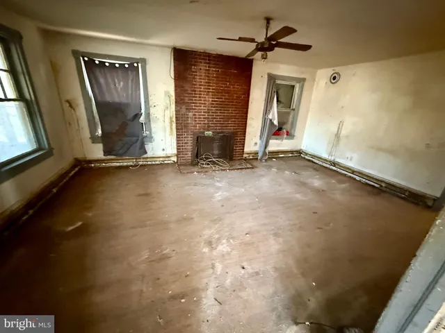 an empty room with windows