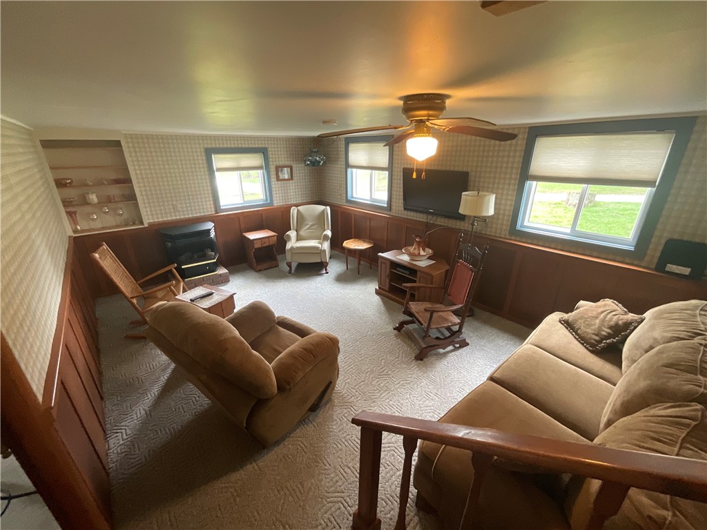 11586 Armison Road Fillmore, NY 14735 - Photo 19 of 31 Lower Level Family Room with Gas Stove