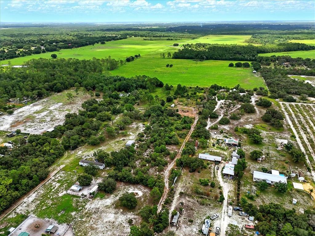 1681 McClellan Road Frostproof, FL 33843 - Photo 9 of 18 a view of a field with an ocean