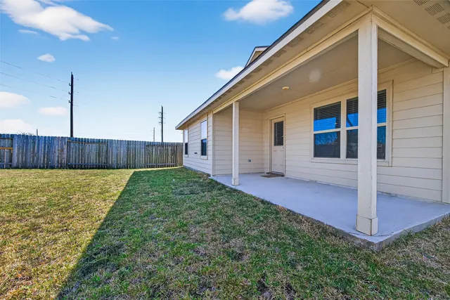 a view of a backyard with a garden
