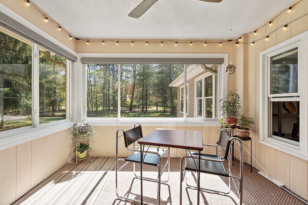 23 Nutting Road Groton, MA 01450 - Photo 17 of 42 a dining room with furniture and large windows