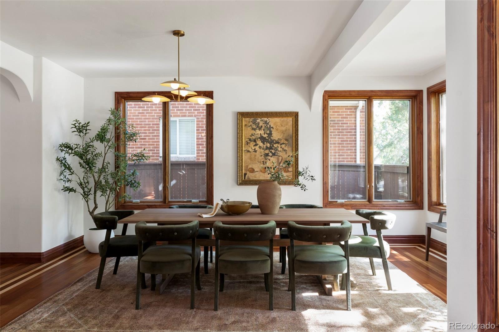 1026 South Cook Street Denver, CO 80209 - Photo 5 of 34 a view of a dining room with furniture window and outside view