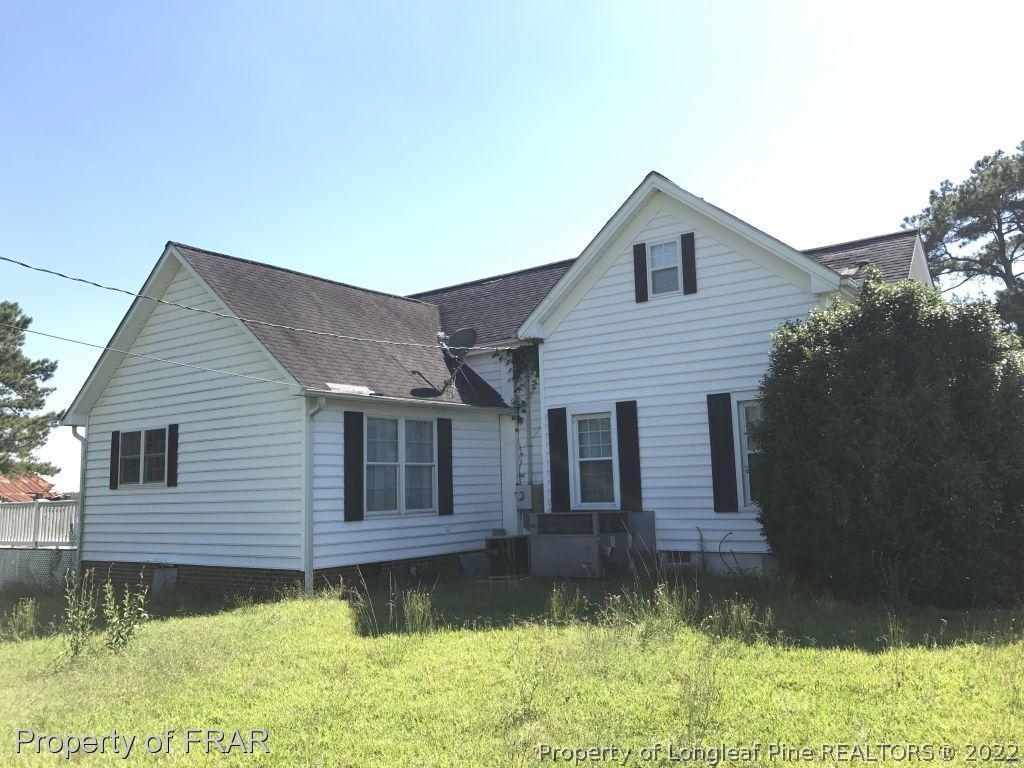 10 Wise Road Dunn, NC 28334 - Photo 2 of 2 a front view of a house with a yard