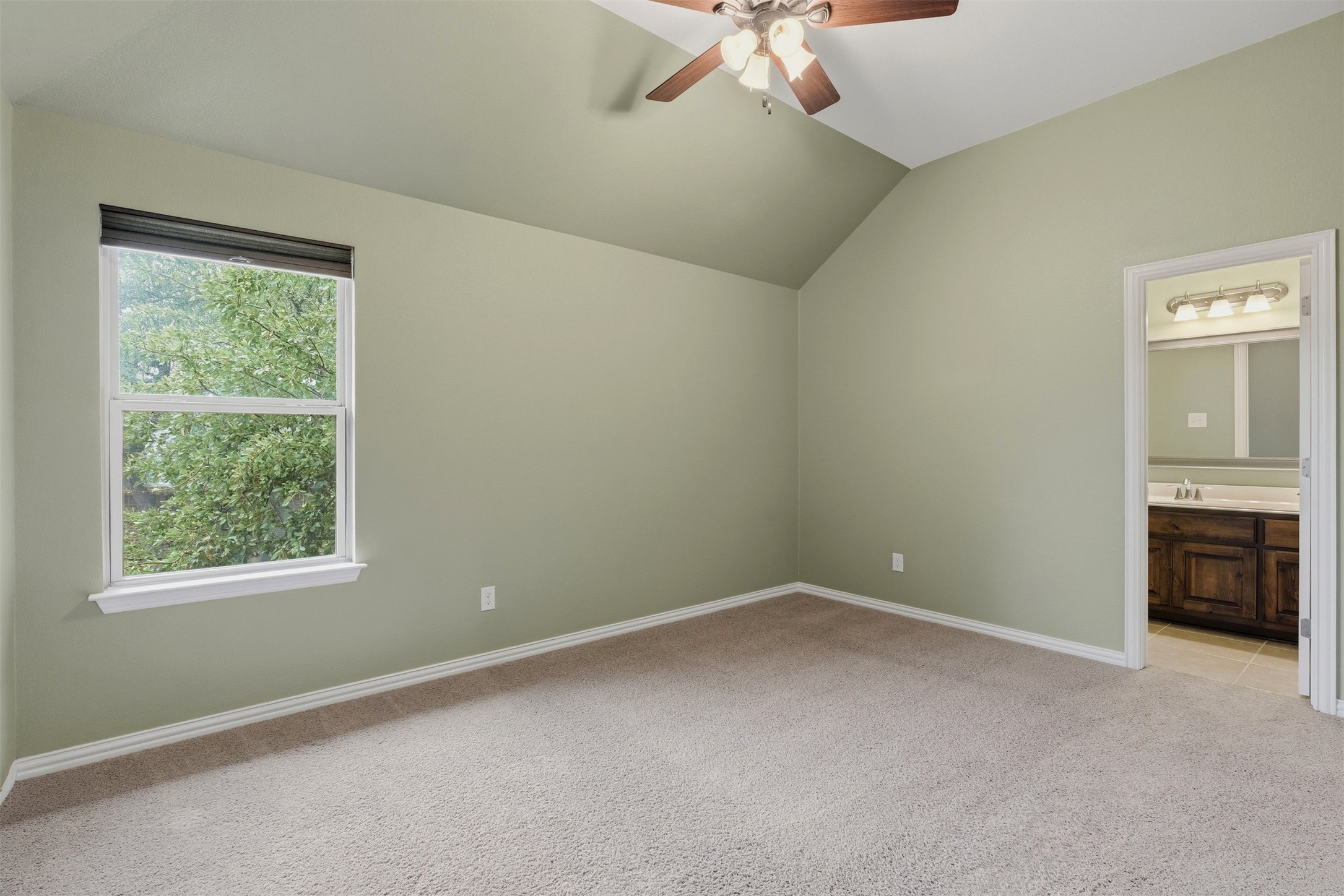 3935 Bowstring Bend Cedar Park, TX 78613 - Photo 29 of 39 This upstairs bedroom includes its own ensuite bath, providing a private and comfortable setup for guests