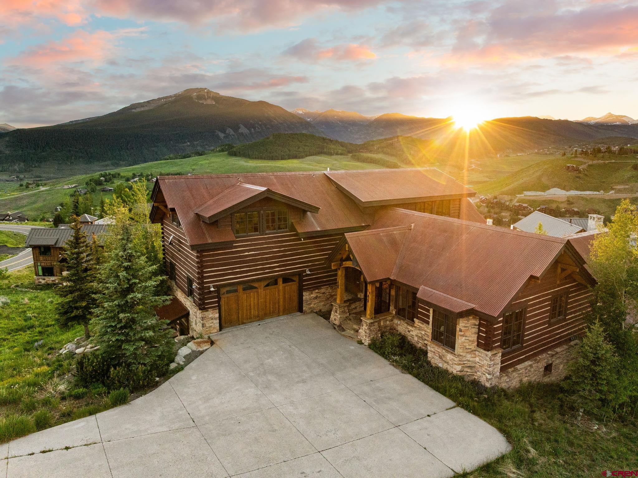 59 Summit Road Crested Butte, CO 81225 - Photo 3 of 45 a view of a terrace with a garden